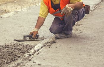 worker installing concrete