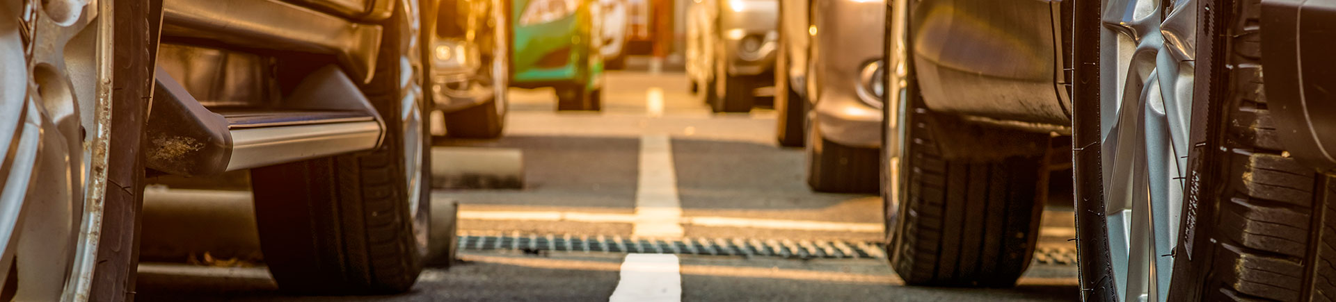 cars parked on a parking lot with line striping