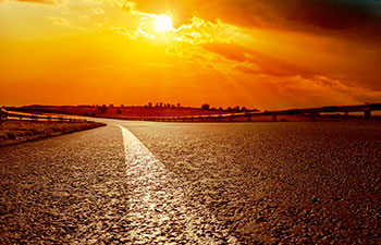 Asphalt Road at Sunset