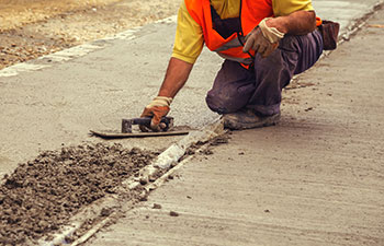 worker installing concrete