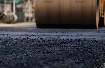 road roller being used during new asphalt construction