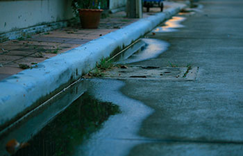 water logging on the street due to catch basin failure