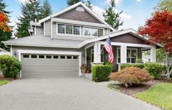 A house with a concrete driveway.