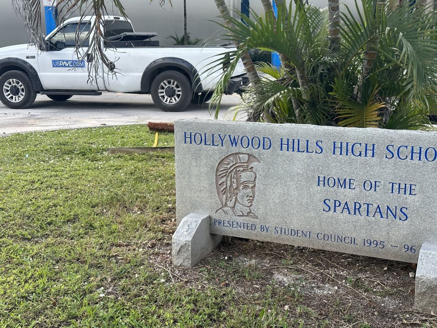 Hollywood Hills High School, “Home of the Spartans” — presented by the Student Council of 1995–96. The sign was standing when Nick was a student.