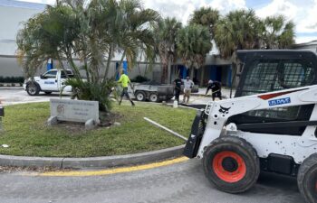 U.S. Pave crew paving beside the Hollywood Hills High School sign