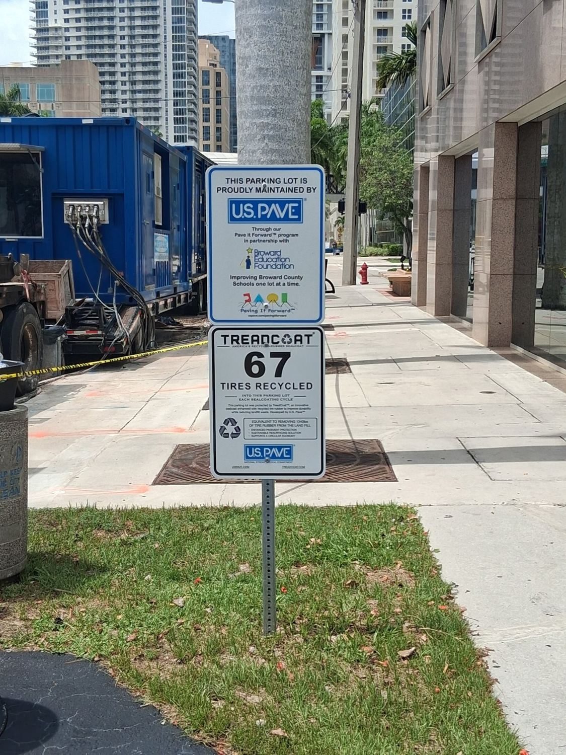 Pave It Forward and TreadCoat signs at the K.C. Wright Administration Center