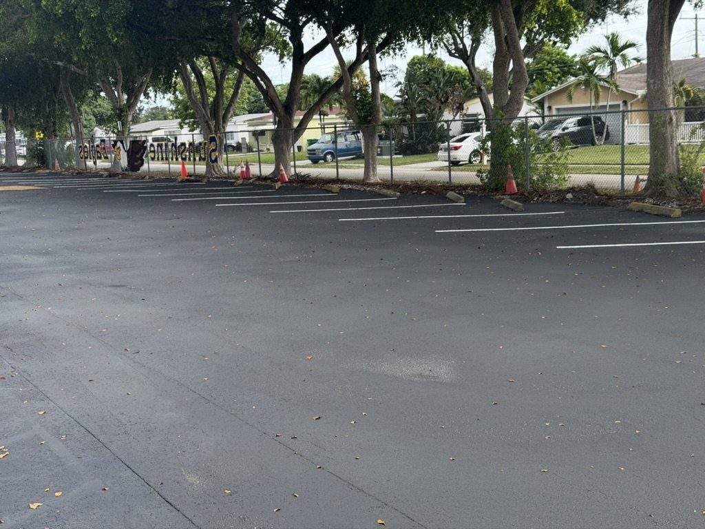 Sunshine Elementary lot sealed with TreadCoat and open for Monday drop-off